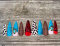 Rodeo Doll handmade turquoise cow print western press on nails with bandana paisley and concho charm, long stiletto