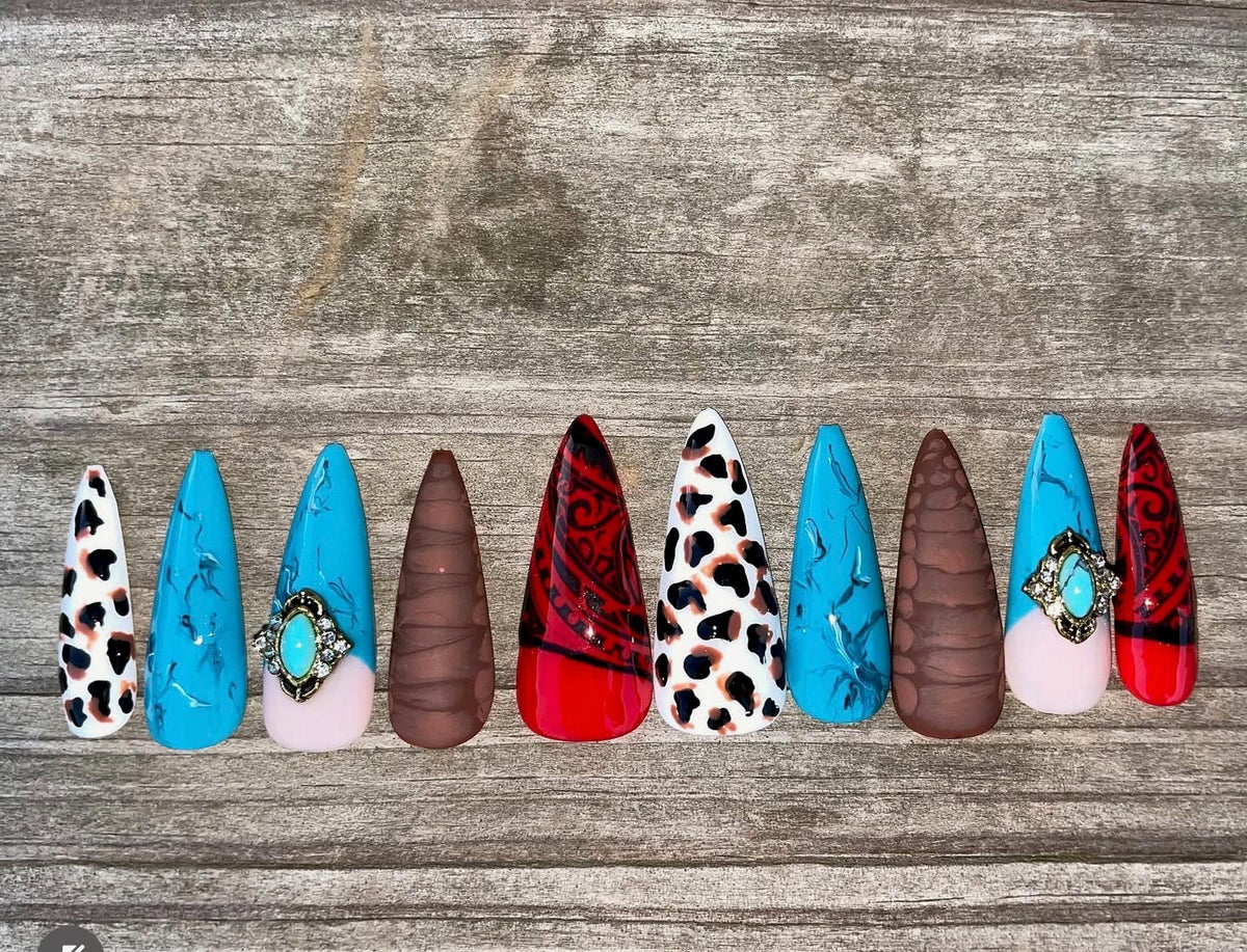 Rodeo Doll handmade turquoise cow print western press on nails with bandana paisley and concho charm, long stiletto