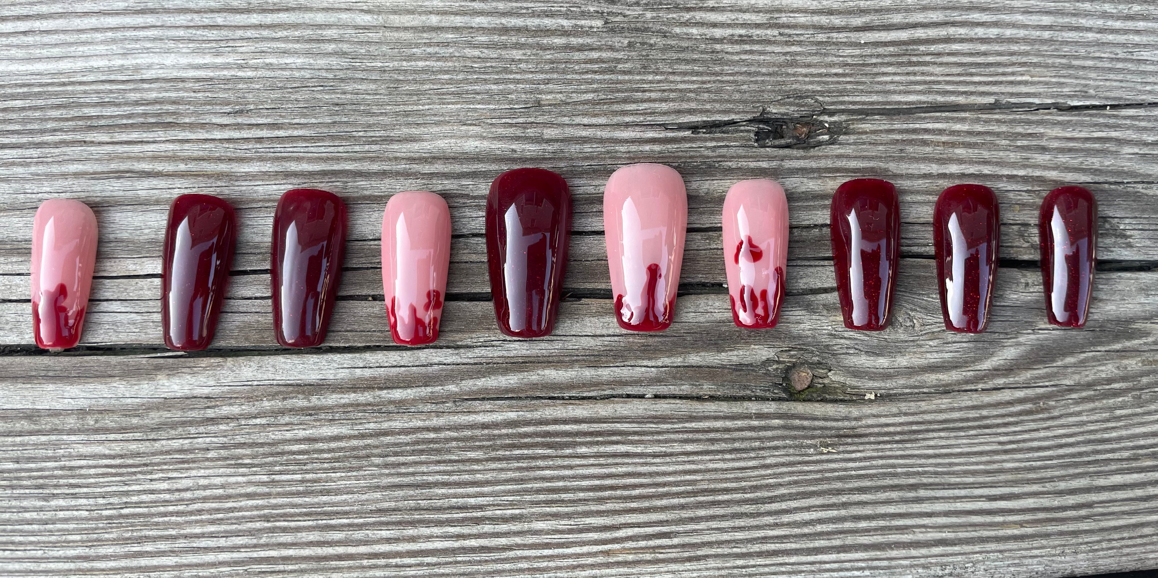 Fresh Kill handmade burgundy and nude press on nails with glossy blood drips, medium coffin