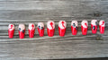 Tails & Trouble handmade red french tip press on nails with hand painted devil tails and tiny ghosts, medium coffin