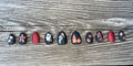 Graveyard Garden handmade matte black halloween press on nails with folk florals ghost skeleton hand and pumpkins, short almond