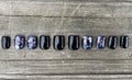 3AM handmade glossy black and midnight blue press on nails with silver violet foil, short square
