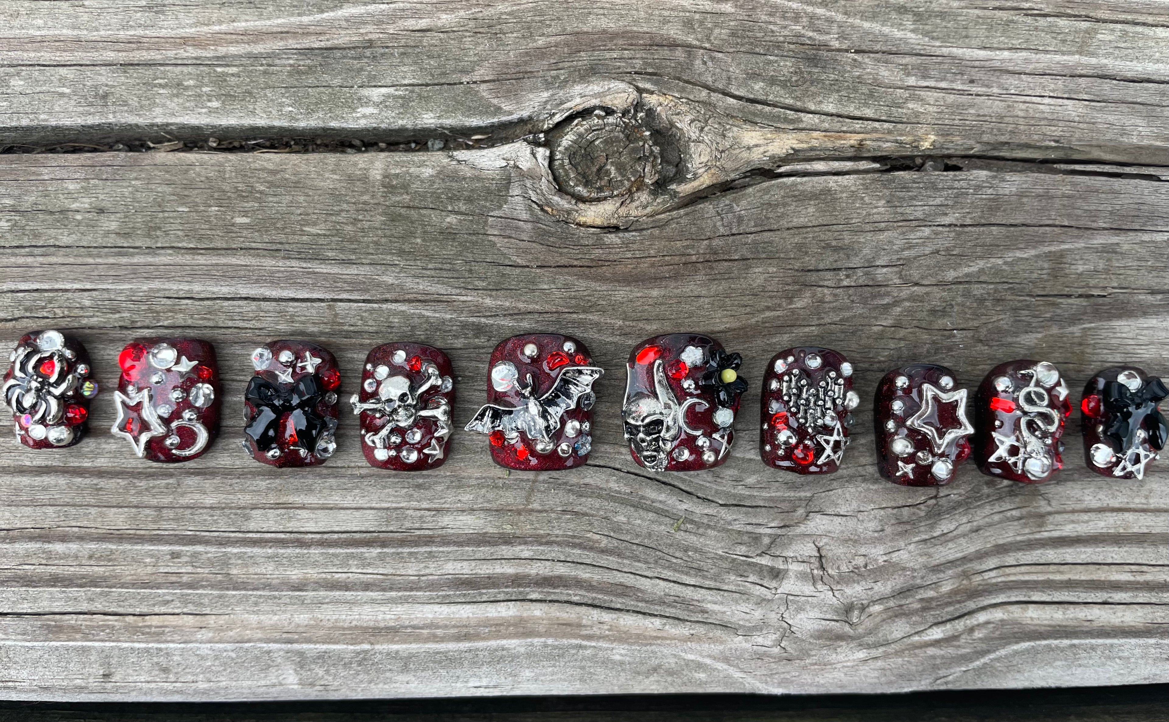 Halloween Junk handmade red jelly halloween junk press on nails with silver skull bat and star charms and rhinestones, short square, view 2