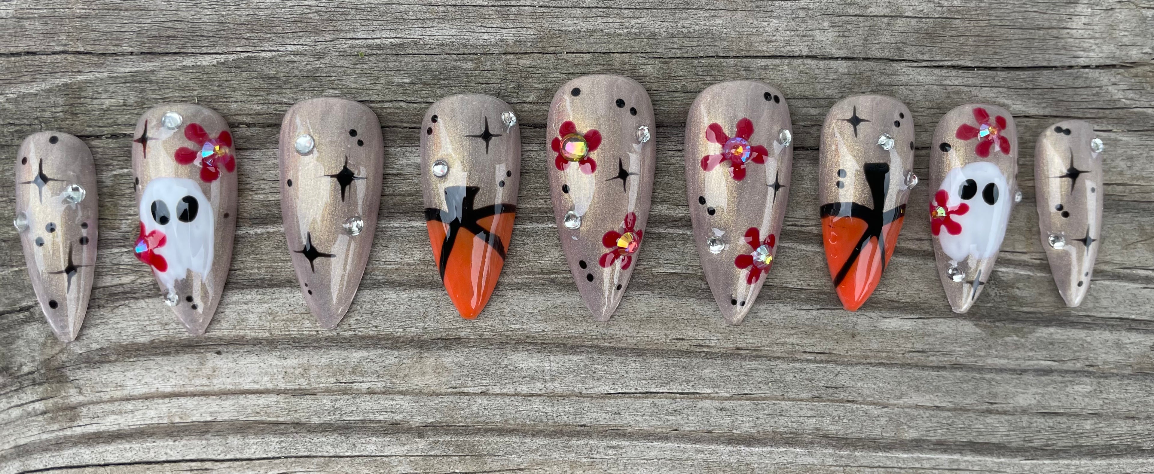 Sweet Seance handmade champagne chrome halloween press on nails with tiny ghosts orange tips and rhinestones, long stiletto