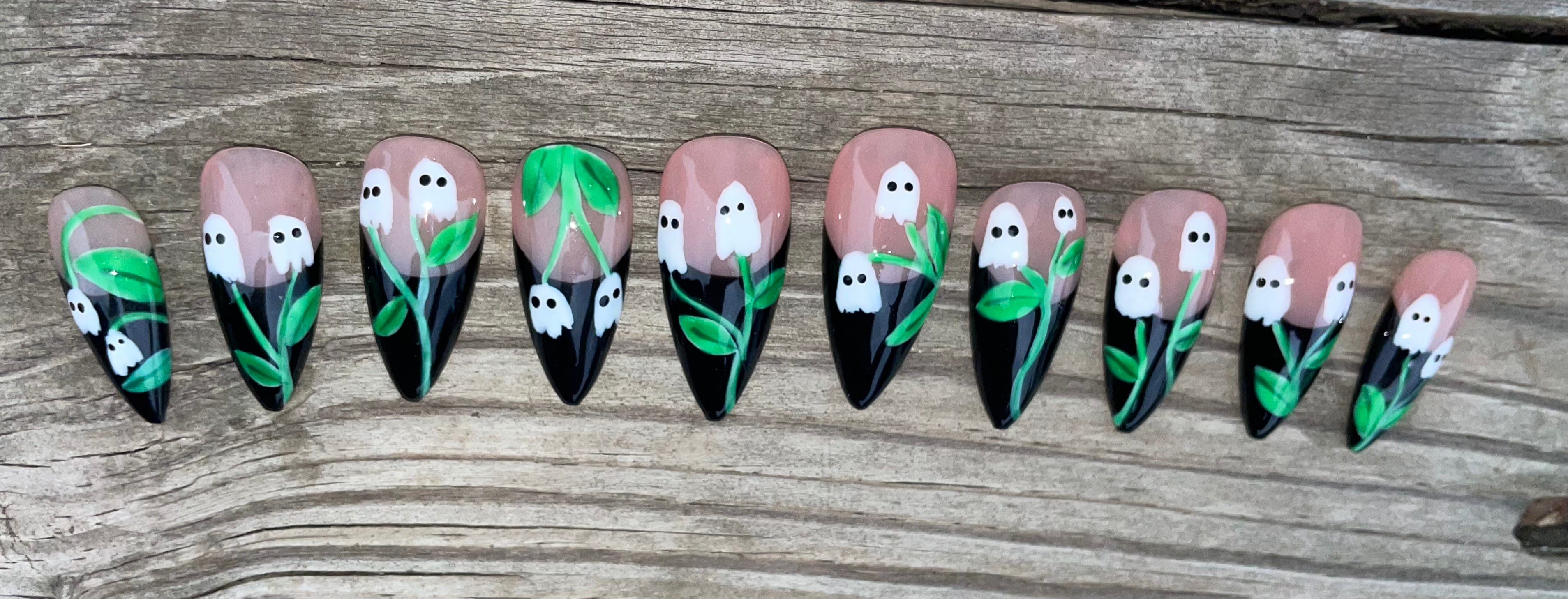 Ghost Lilies handmade black french tip press on nails with hand painted ghost flowers and green vines, long stiletto