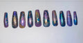 Shattered Cosmos handmade purple blue and gold galaxy chrome foil press on nails with mystical eye accent, long coffin
