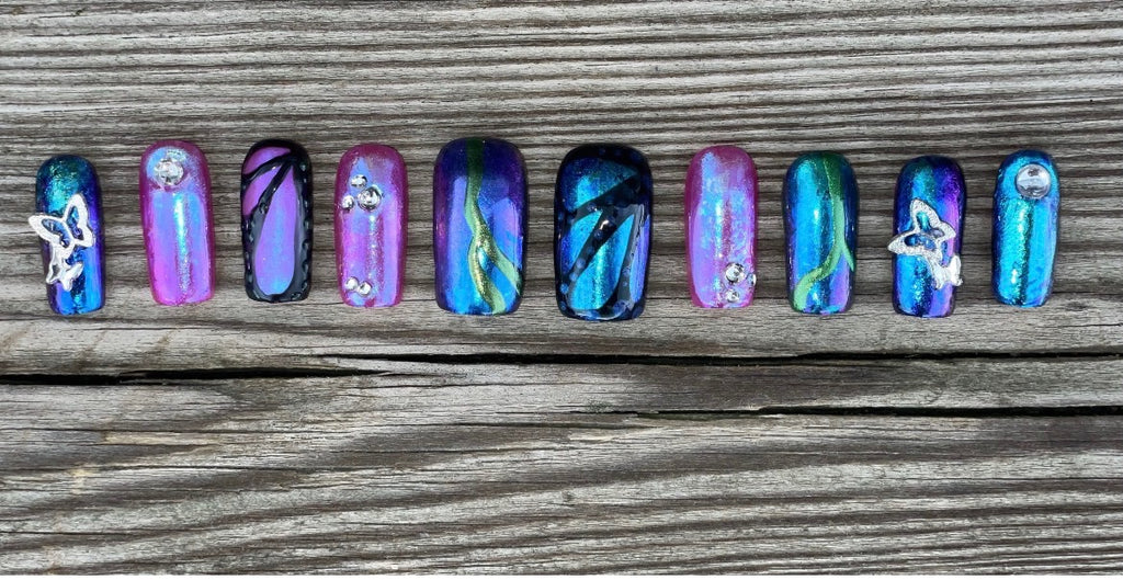 Butterfly Effect handmade iridescent chrome press on nails with butterfly charms and rhinestones